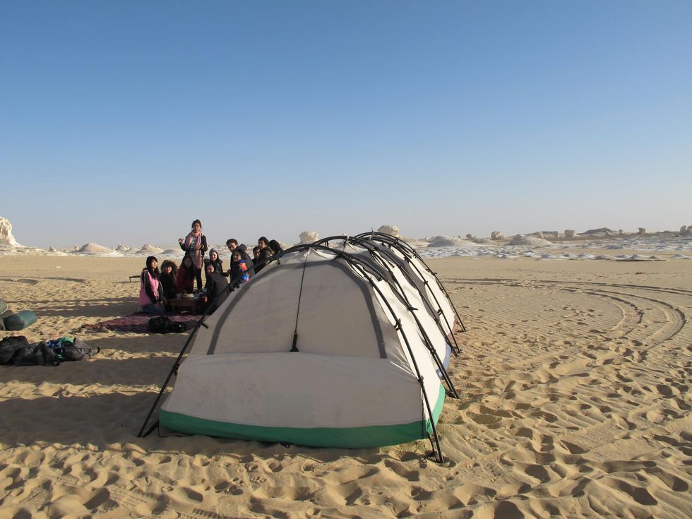 Tent, Sand, Natural environment, Landscape, Camping, Ecoregion, Aeolian landform, Beach, Shade, Wind, 