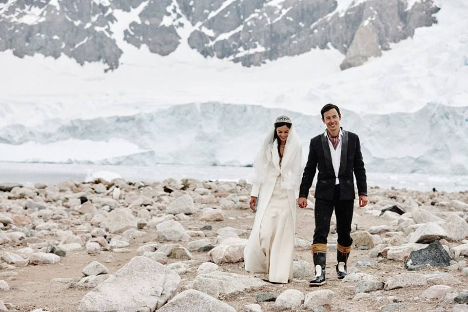 Trousers, Coat, Photograph, Outerwear, Winter, Standing, Suit, People in nature, Glacial landform, Mountain range, 