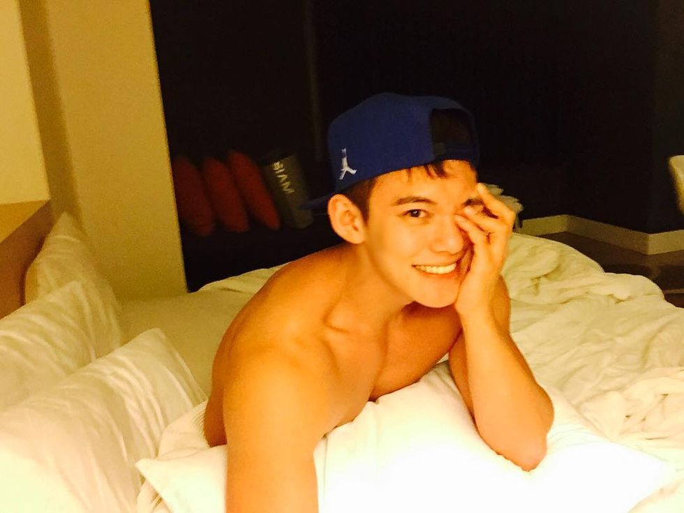 Ear, Cap, Comfort, Muscle, Black hair, Linens, Tooth, Barechested, Baseball cap, Pillow, 