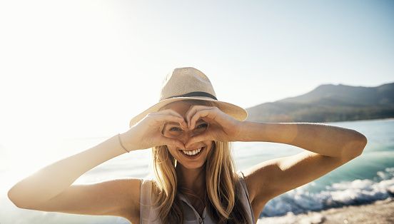 Skin, Hat, Happy, People in nature, Rejoicing, Facial expression, Summer, Sunlight, Costume accessory, Travel, 