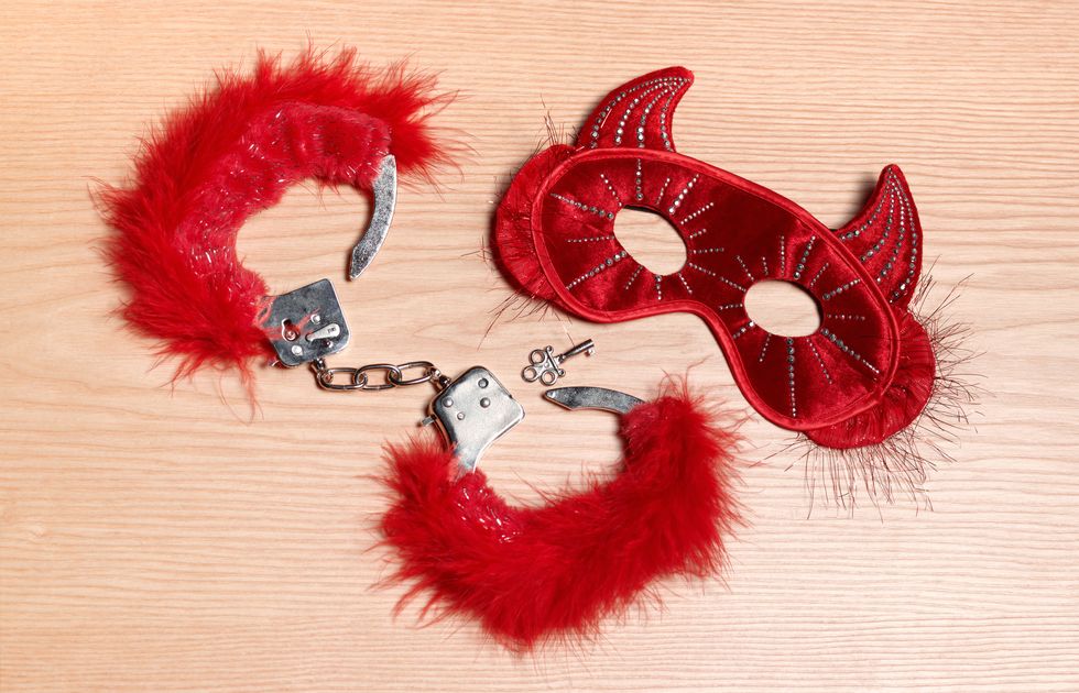 Fur, Red, Ear, Font, Fashion accessory, Tail, Feather, Costume accessory, Glasses, 