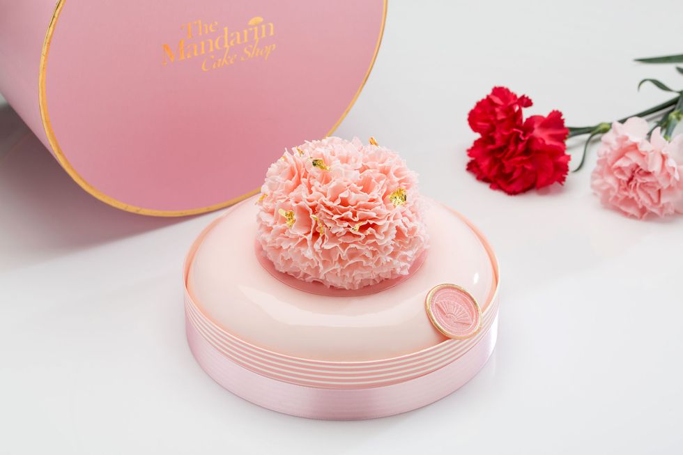 Pink, Peach, Party favor, Sugar cake, Flower, Food, Dessert, Sweetness, Petal, Artificial flower, 