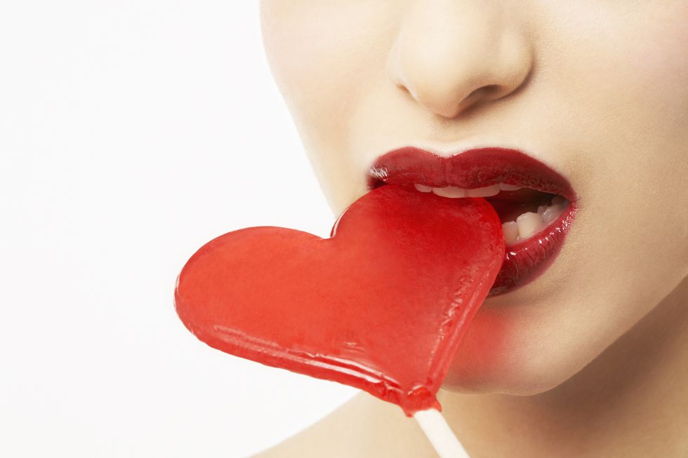 Lip, Red, Heart, Organ, Mouth, Sweetness, Love, Neck, Lollipop, Human body, 