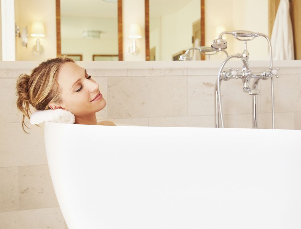 Bathtub, White, Skin, Beauty, Bathroom, Room, Plumbing fixture, Bathing, Tile, Material property, 