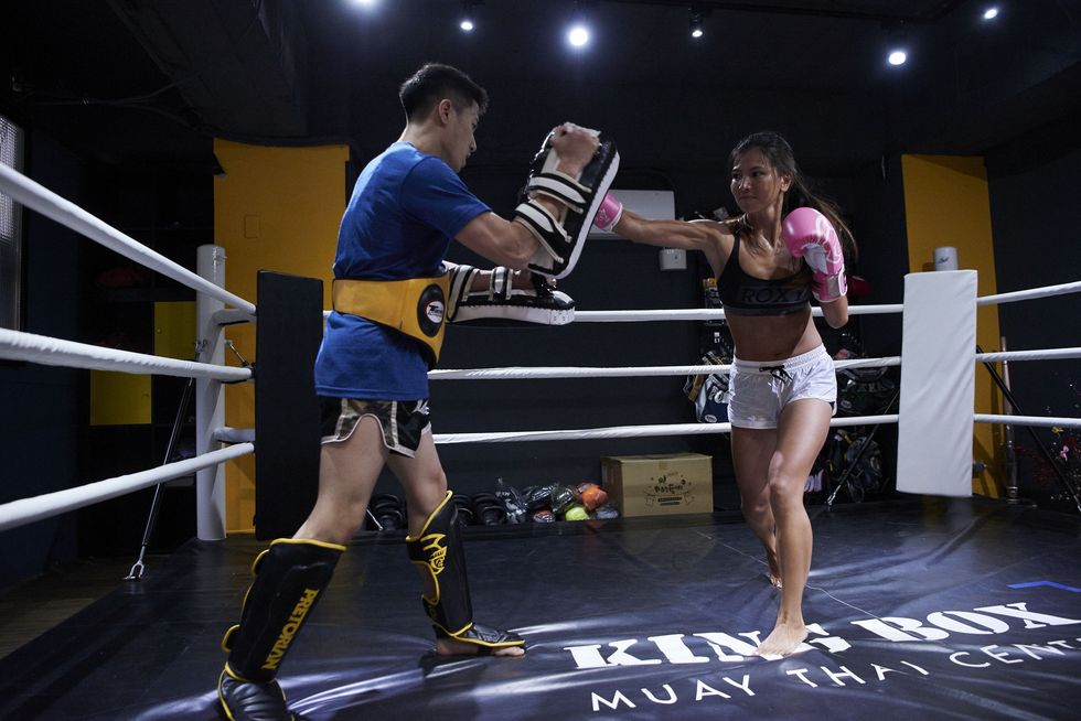 Combat sport, Boxing ring, Contact sport, Sport venue, Professional boxer, Boxing, Striking combat sports, Muay thai, Boxing equipment, Boxing glove, 