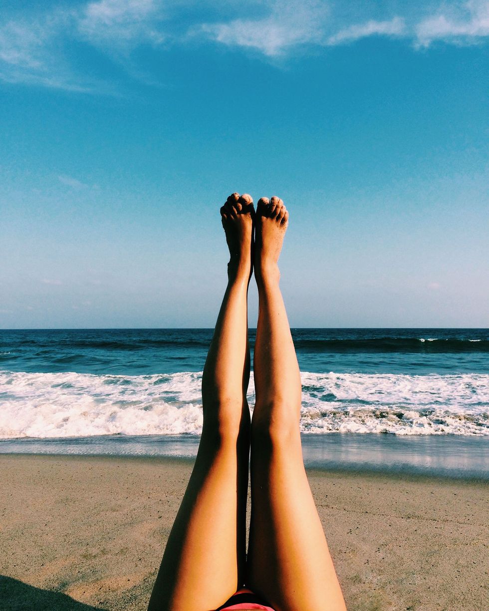 People in nature, Human leg, Sun tanning, Leg, Sky, Beach, Tan, Blue, Summer, Sea, 
