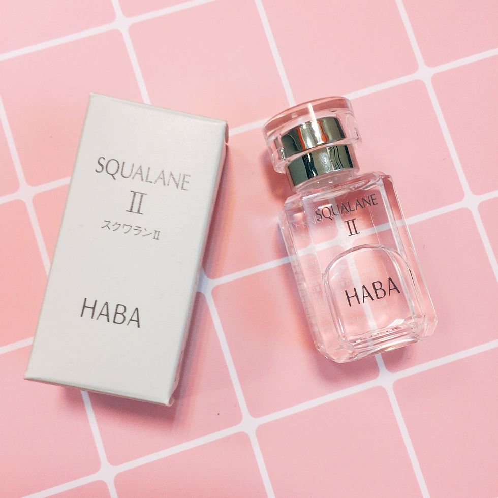 Product, Pink, Perfume, Glass bottle, Font, Material property, Peach, Label, Bottle, Liquid, 