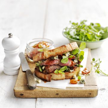 steak sandwich with blue cheese and sweet and sour tomatoes