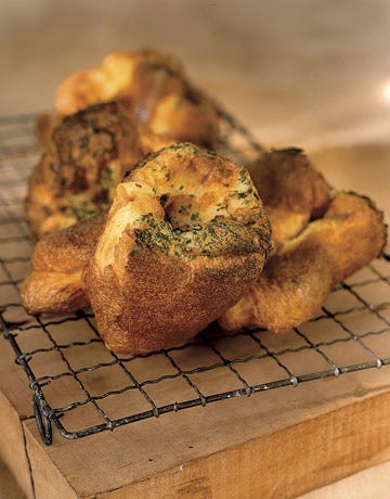 herbed popover rolls on a cooling rack