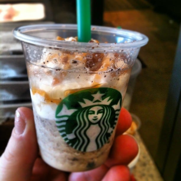 Finger, Drink, Drinkware, Drinking straw, Coffee, Fast food, Nail, Non-alcoholic beverage, Coffee milk, Thumb, 