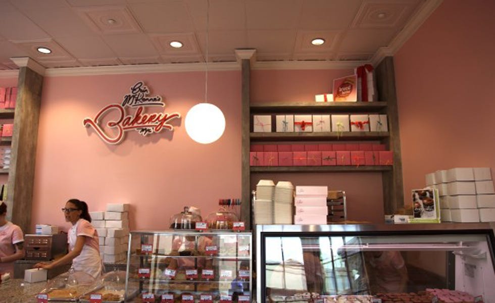 Ceiling, Light fixture, Countertop, Shelf, Shelving, Ceiling fixture, Bottle, Restaurant, Fast food, Customer, 