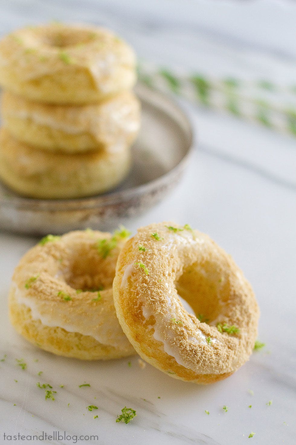 Baked Key Lime Pie Doughnuts <p>Get your key lime fix in the morning by whipping up these baked doughnuts with a lime glaze.</p>
<p>Get the recipe at <a target="_blank" href="http://www.tasteandtellblog.com/baked-key-lime-pie-donuts-key-lime-blog-party/">Taste and Tell</a>.</p>