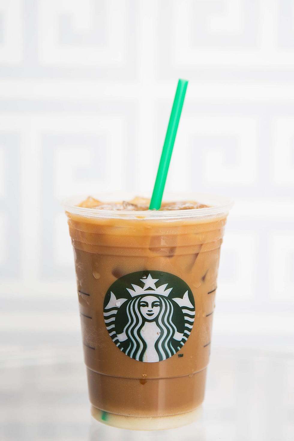 Brown, Green, Drinking straw, Drink, Logo, Fast food, Drinkware, Coffee, Non-alcoholic beverage, Cup, 