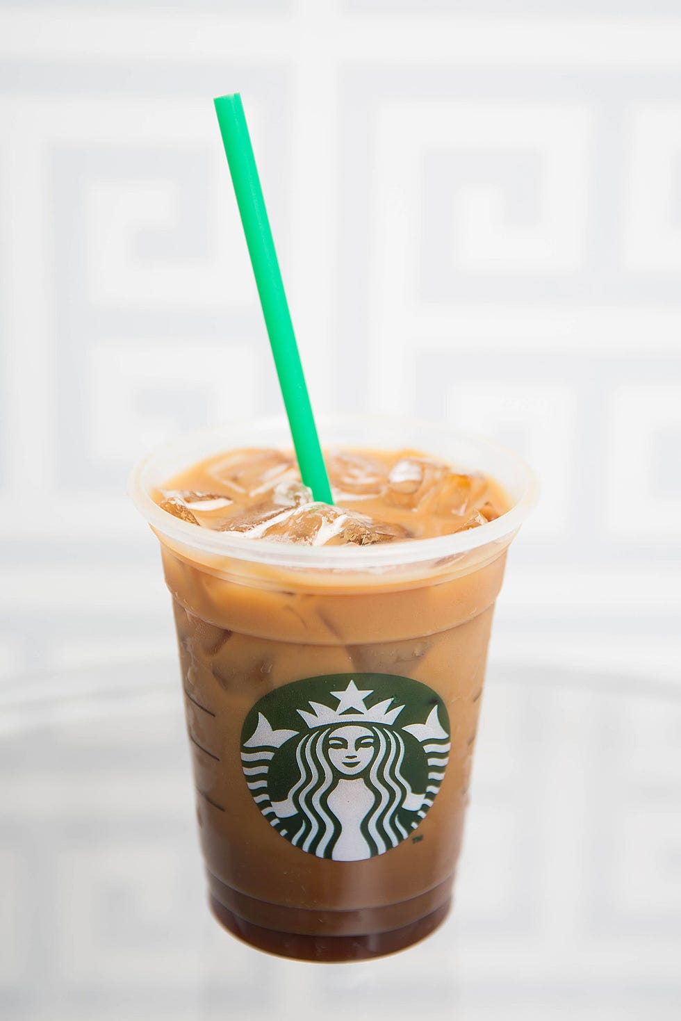 Brown, Drinking straw, Drink, Coffee, Drinkware, Logo, Fast food, Ingredient, Non-alcoholic beverage, Coffee milk, 