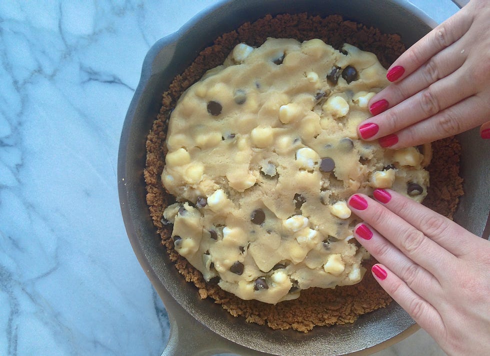 Pressing dough into crust