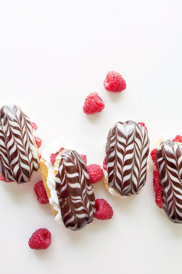 <p>Add some color to your pastries with ruby red raspberries.</p>
<p>Get the recipe from <a target="_blank" href="http://www.bakersroyale.com/fruit/raspberry-eclairs/">Bakers Royale</a>.</p>
