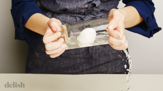 Can you really peel a boiled egg using a glass of water? We put this food hack to the test.