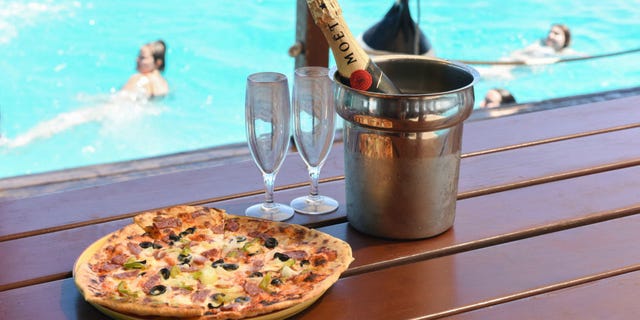 Food, Swimming pool, Fluid, Pizza, Baked goods, Ingredient, Liquid, Dish, Tableware, Cuisine, 