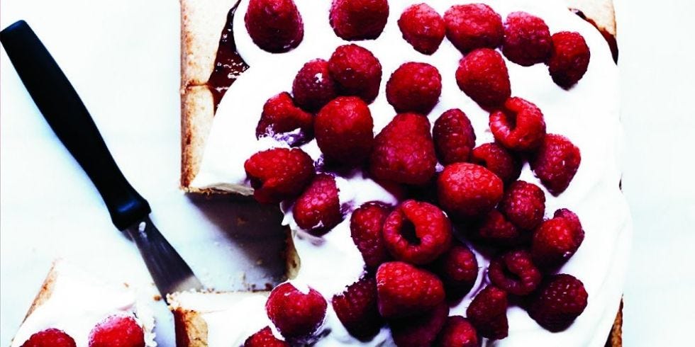 Party Cake with Whipped Cream and Raspberries