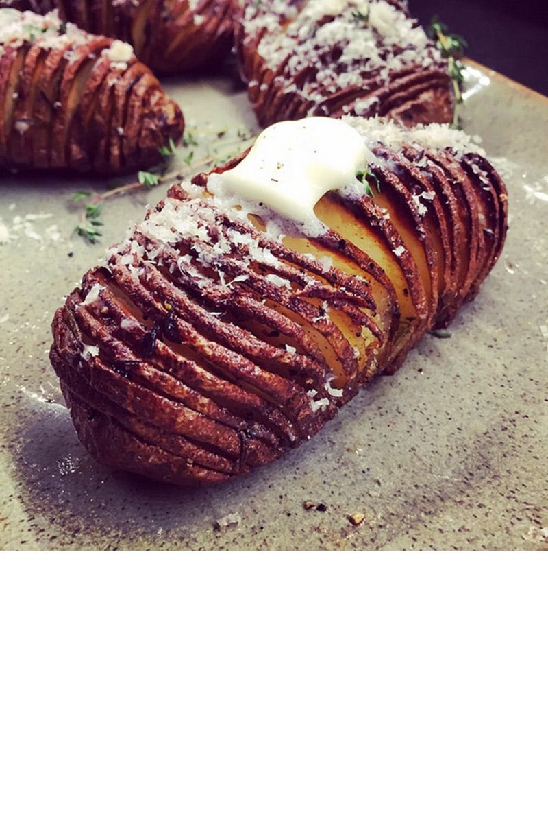 The model (and master chef, practically) topped herb-roasted hasselback potatoes with butter and parmesan, adding yet another mouthwatering photo to her food-filled Instagram account. <a target="_blank" href="https://instagram.com/chrissyteigen">@chrissyteigen</a>