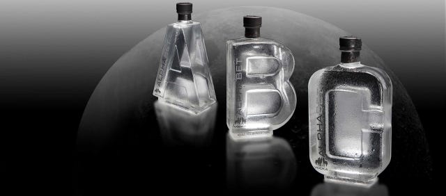 Liquid, Fluid, Bottle, Glass bottle, Perfume, Black, Still life photography, Grey, Transparent material, Solvent, 