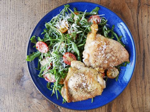 baked chicken thighs with arugula caesar salad