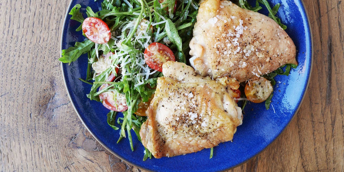 Baked Chicken Thighs with Arugula Caesar Salad