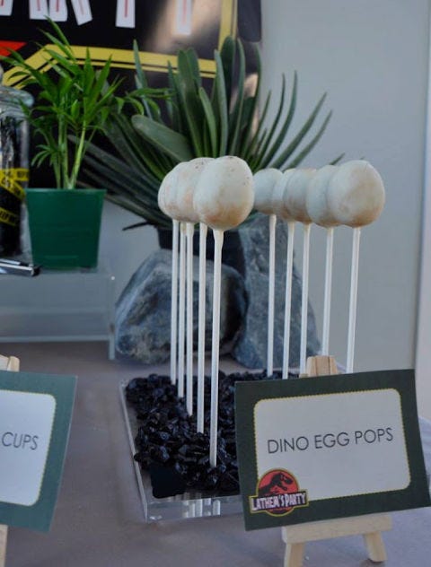 <p>If you've ever tried to create a puppy, panda or Ryan Gosling's face in cake pop form, you know it is not as easy as those tutorials suggest. Thankfully, the most complicated a <a target="_blank" href="http://littlebigco.blogspot.com.au/2013/07/a-jurassic-park-themed-birthday-party.html">dino egg pop</a> gets is dipping the molded cake into white chocolate. The Little Big Company shares its <a target="_blank" href="http://littlebigco.blogspot.com.au/2013/07/a-jurassic-park-themed-birthday-party.html"><em>Jurassic Park</em>-themed party here</a>, and you can find a <a target="_blank" href="http://www.bakerella.com/basic-cake-pops-recipe/">recipe for cake pops here</a>.</p>

