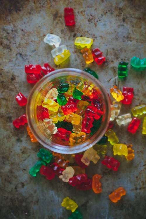Yellow, Red, Amber, Confectionery, Colorfulness, Gummi candy, Sweetness, Gelatin, Gummy bear, Candy, 
