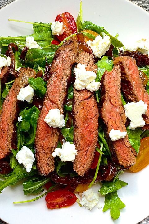 grilled skirt steak salad with arugula, balsamicglazed onions, tomatoes, and feta  delishcom