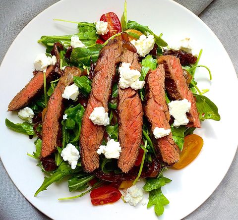 grilled skirt steak salad with arugula, balsamic glazed onions, tomatoes, and feta