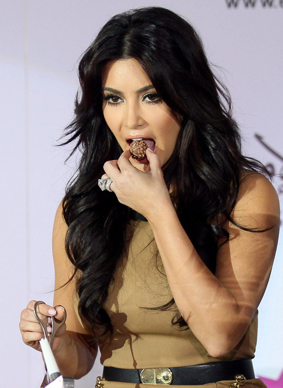 Kim may be the daintiest chocolate eater ever. #skillz