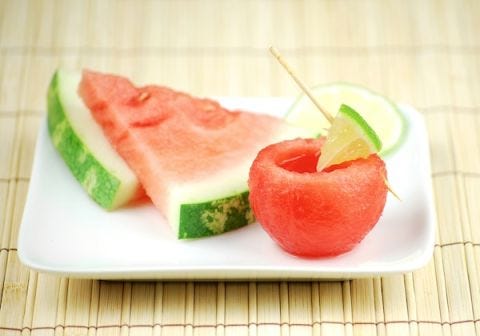 <p>Scoop out watermelon with an ice cream scooper, hollow out the center, and pour in your alcohol of choice for a refreshing drink on a hot summer day.</p>
<p>Get the recipe at <a target="_blank" href="http://www.sheknows.com/food-and-recipes/articles/968495/3-edible-shot-glasses">She Knows</a>.</p>
