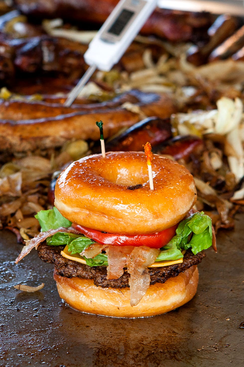 Also known as the Luther Burger, this meal combines savory and sweet by sandwiching a classic patty and all the fixin's with two Krispy Kreme glazed doughnuts. At some fairs it's harder to find local Krispy Kreme shops—like <a target="_blank" href="http://njfair.com/">State Fair Meadowlands</a> in New Jersey; the nearest one is in Penn Station in Manhattan—<a target="_blank" href="http://littlerichardsrestaurant.com/">Little Richards</a> owner Dave Higman will drive out and buy 100 at a time, then freeze them and use them as needed. "They grill better when they're frozen anyway," he says. "If they're fresh, the donuts will mush down as they heat up."