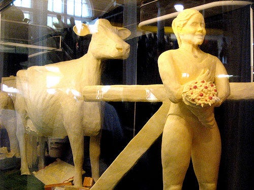 Shawn Johnson is the 2008 Olympic balance beam gold medalist. What's better than a golden medal? A golden statue! I mean, it's butter, but it still looks like gold, right?