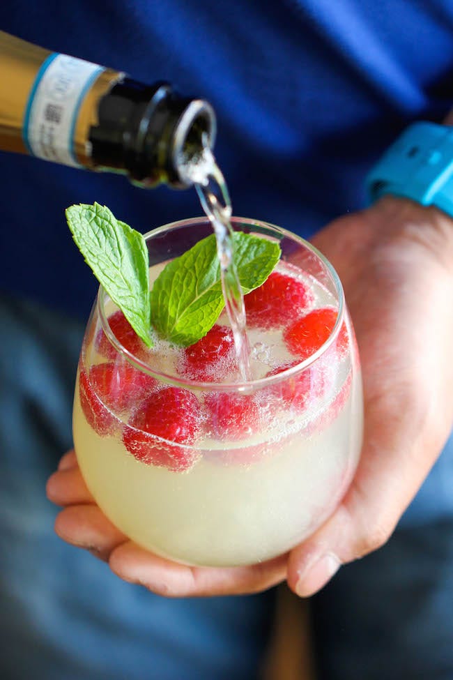 Fluid, Drink, Alcoholic beverage, Liquid, Bottle, Cocktail, Classic cocktail, Glass bottle, Distilled beverage, Cocktail garnish, 