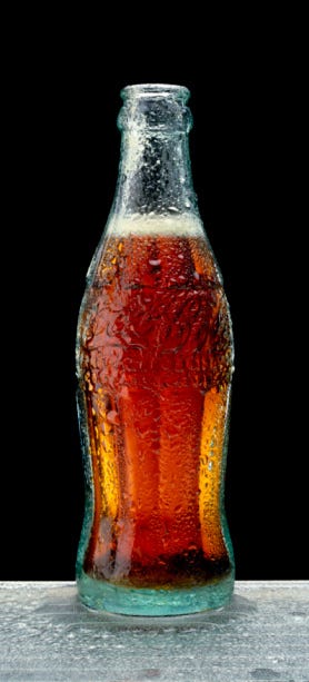 Bottle, Drink, Cola, Soft drink, Glass bottle, Product, Coca-cola, Carbonated soft drinks, Beer bottle, Glass, 