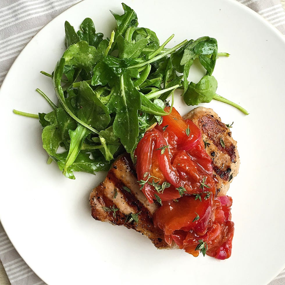 grilled pork chops with plums, red onions, and arugula