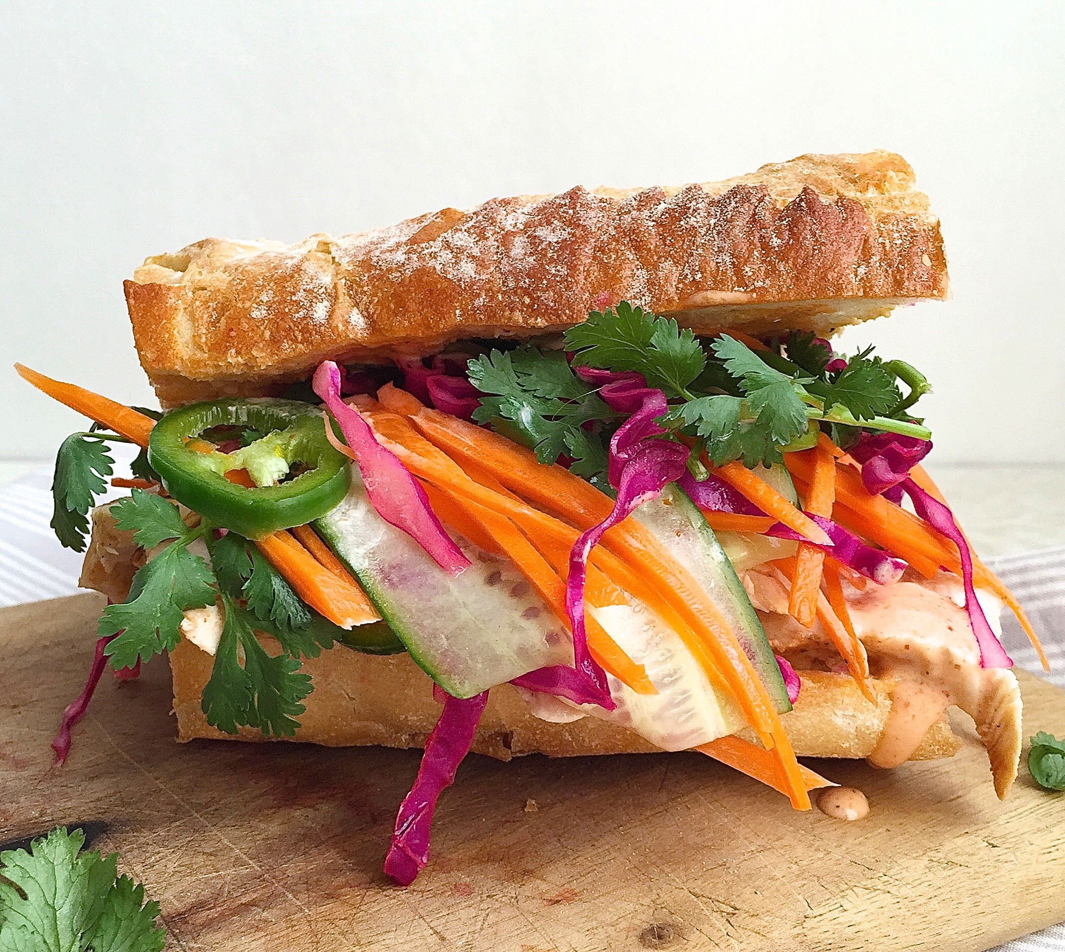 Best Grilled Chicken Banh Mi With Pickled Vegetables And Sriracha Mayo Recipe How To Make Grilled Chicken Banh Mi With Pickled Vegetables And Sriracha Mayo Delish Com