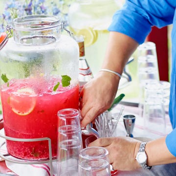 Hand, Watch, Liquid, Juice, Drink, Wrist, Cocktail, Sea breeze, Daiquiri, Ingredient, 