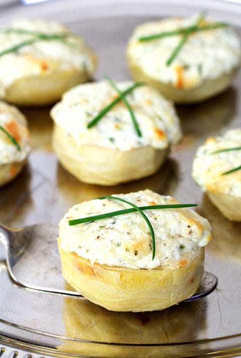 <p>This creamy hot appetizer is stupid easy to make.</p><p>Get the recipe from <a href="http://www.acookbookobsession.com/goat-cheese-stuffed-artichoke-bottoms/">A Cookbook Obsession</a>.<span></span></p>