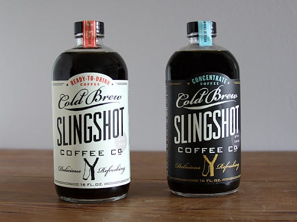 Liquid, Bottle, Alcohol, Alcoholic beverage, Bottle cap, Drink, Distilled beverage, Logo, Font, Glass bottle, 