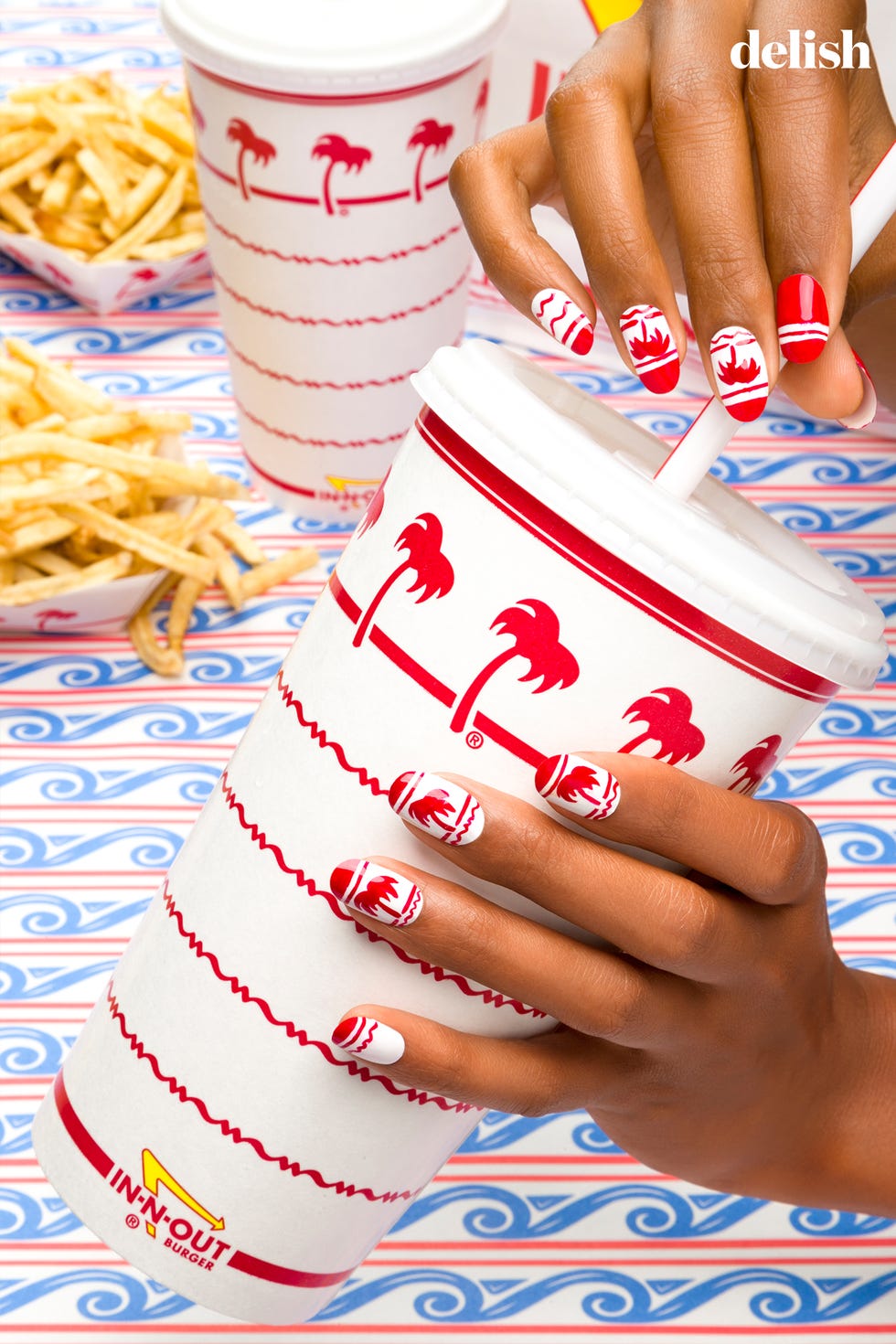 Finger, Nail, Liquid, French fries, Dish, Fried food, Peach, Thumb, Side dish, Nail care, 