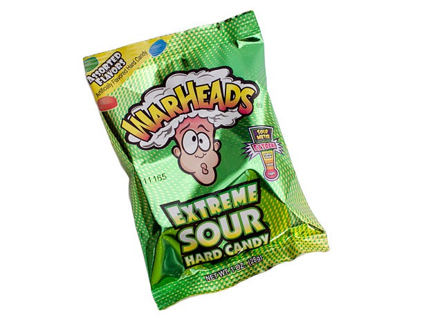 Green, Convenience food, Snack, Junk food, Symbol, Confectionery, Label, 