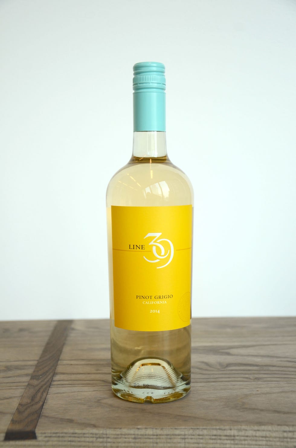 Liquid, Glass bottle, Fluid, Yellow, Bottle, Drink, Alcohol, Alcoholic beverage, Amber, Drinkware, 