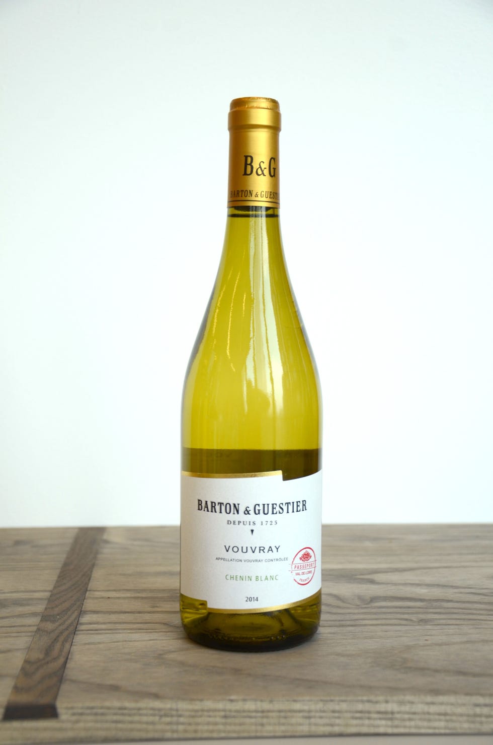 Glass bottle, Product, Yellow, Wood, Bottle, Drink, Alcoholic beverage, Hardwood, Alcohol, Wine bottle, 
