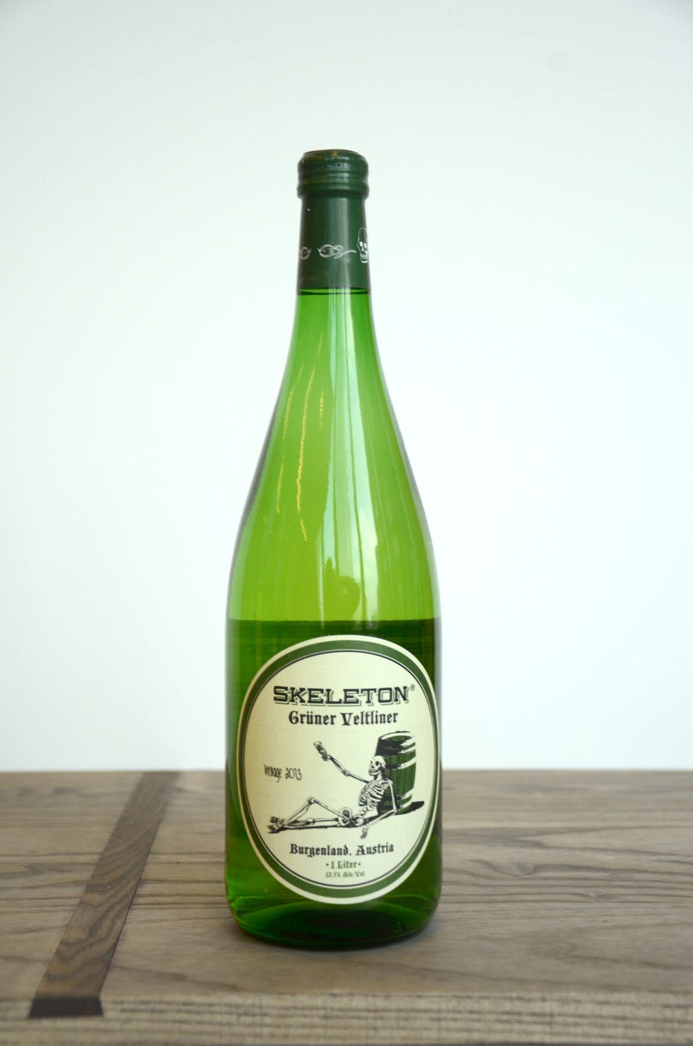 Glass bottle, Green, Wood, Bottle, Drink, Alcoholic beverage, Hardwood, Alcohol, Black, Label, 