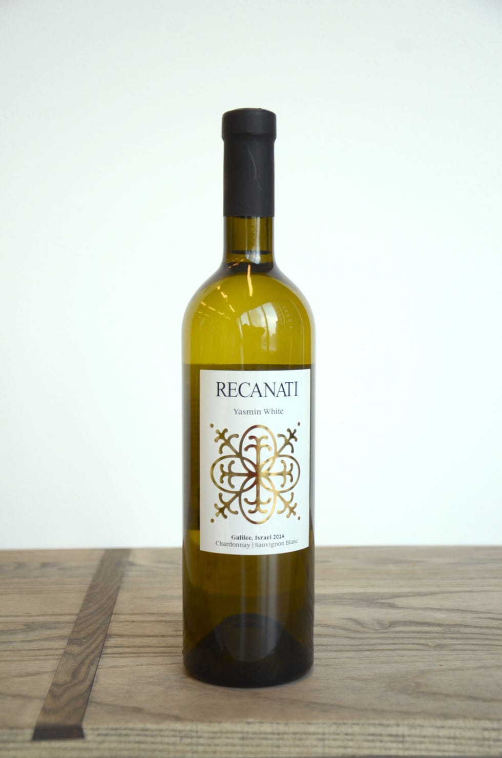 Glass bottle, Wood, Product, Liquid, Yellow, Bottle, Drink, Alcohol, Alcoholic beverage, Wine bottle, 