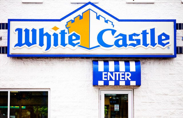 Blue, Text, Real estate, Font, Signage, Facade, Majorelle blue, Sign, Triangle, 