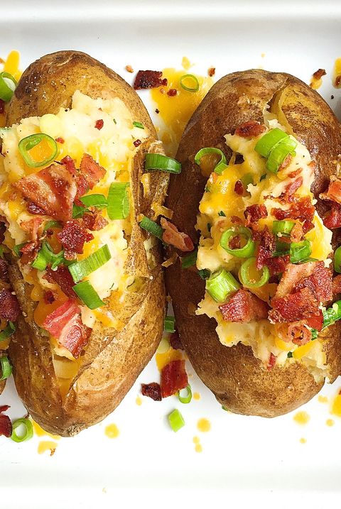 a few baked potatoes stuffed bacon and cheddar then topped with chives